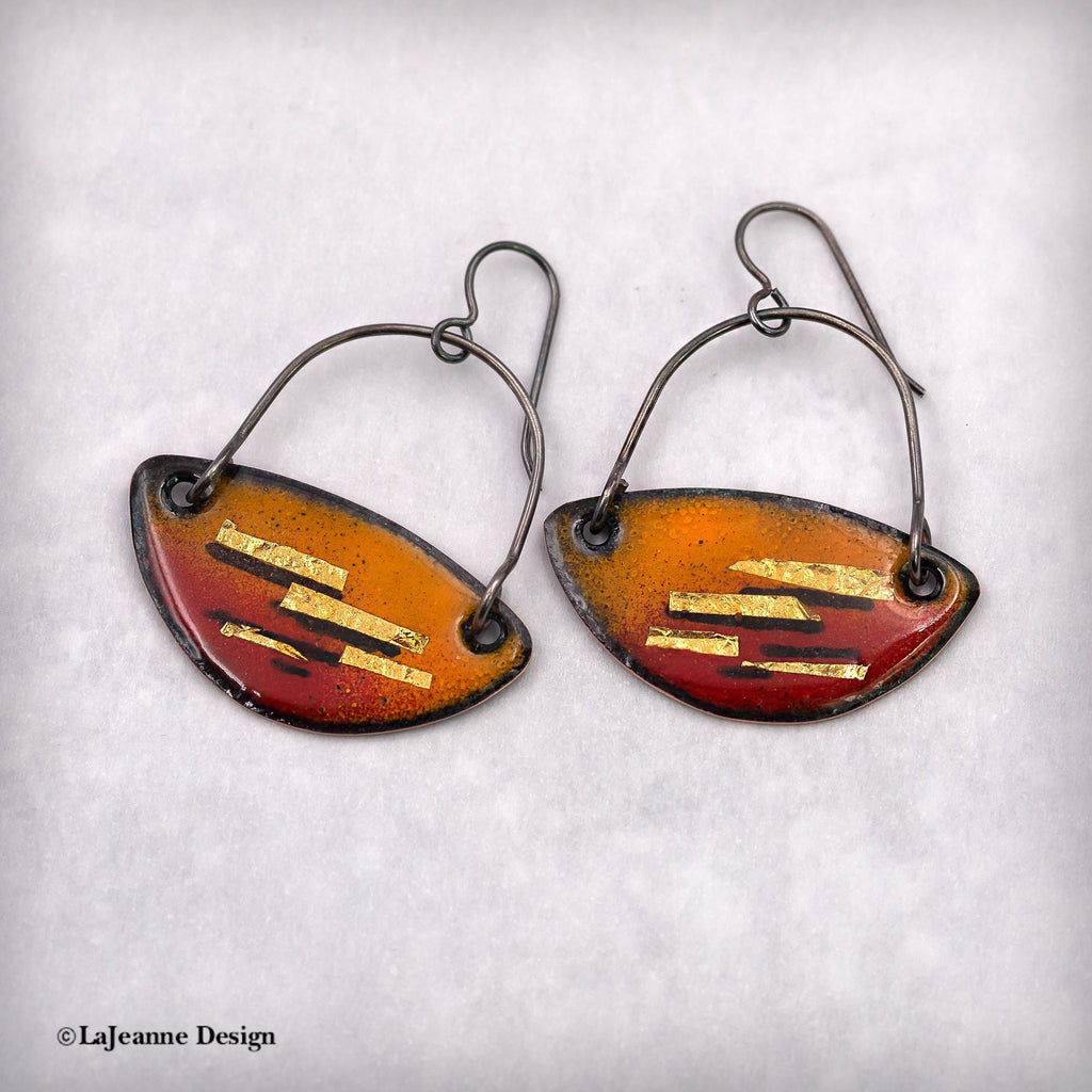 Enamel teardrop dangle earrings, orange-red enamel with gold-tone stripes and metal hooks