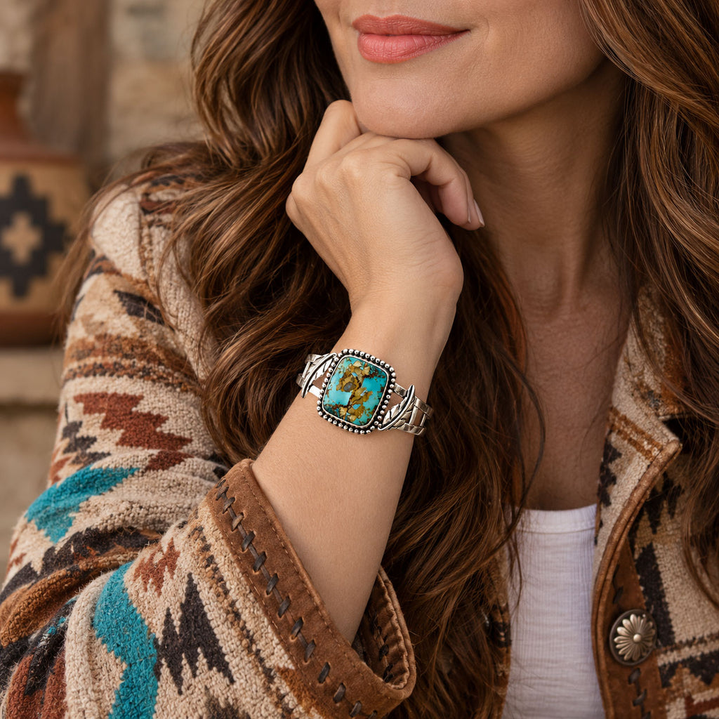 Turquoise inlay sterling silver cuff bracelet with ornate rope border detail
