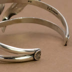 Sterling silver cuff bracelet close-up of inner stamp and side detail