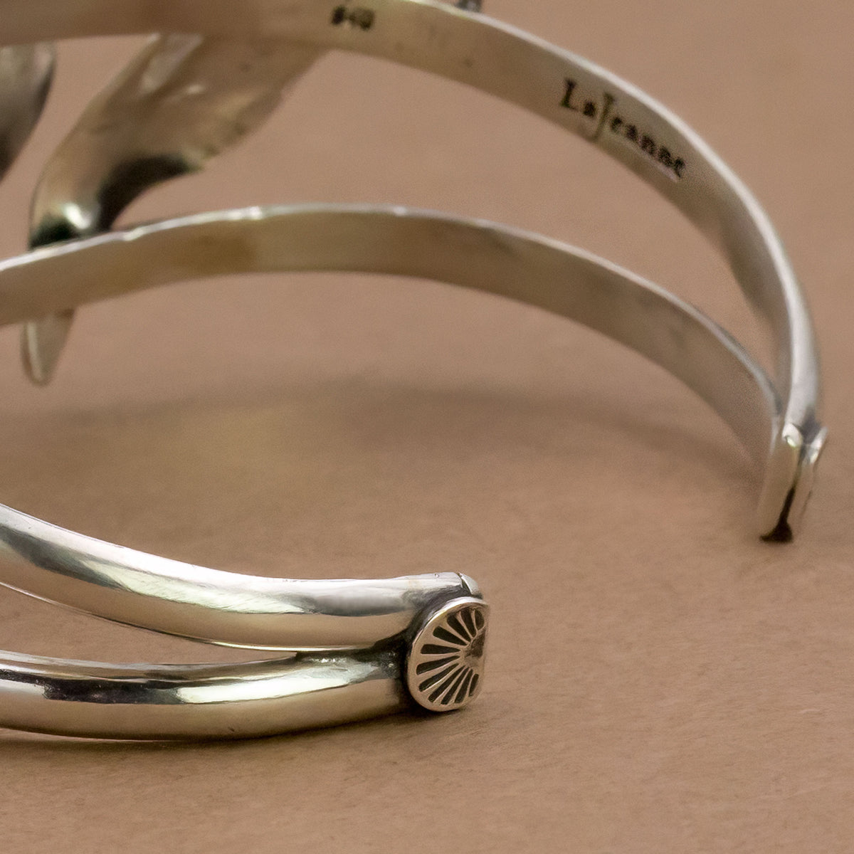Sterling silver cuff bracelet close-up of inner stamp and side detail