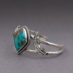 Turquoise bezel cuff bracelet in sterling silver with hinge-style open ends