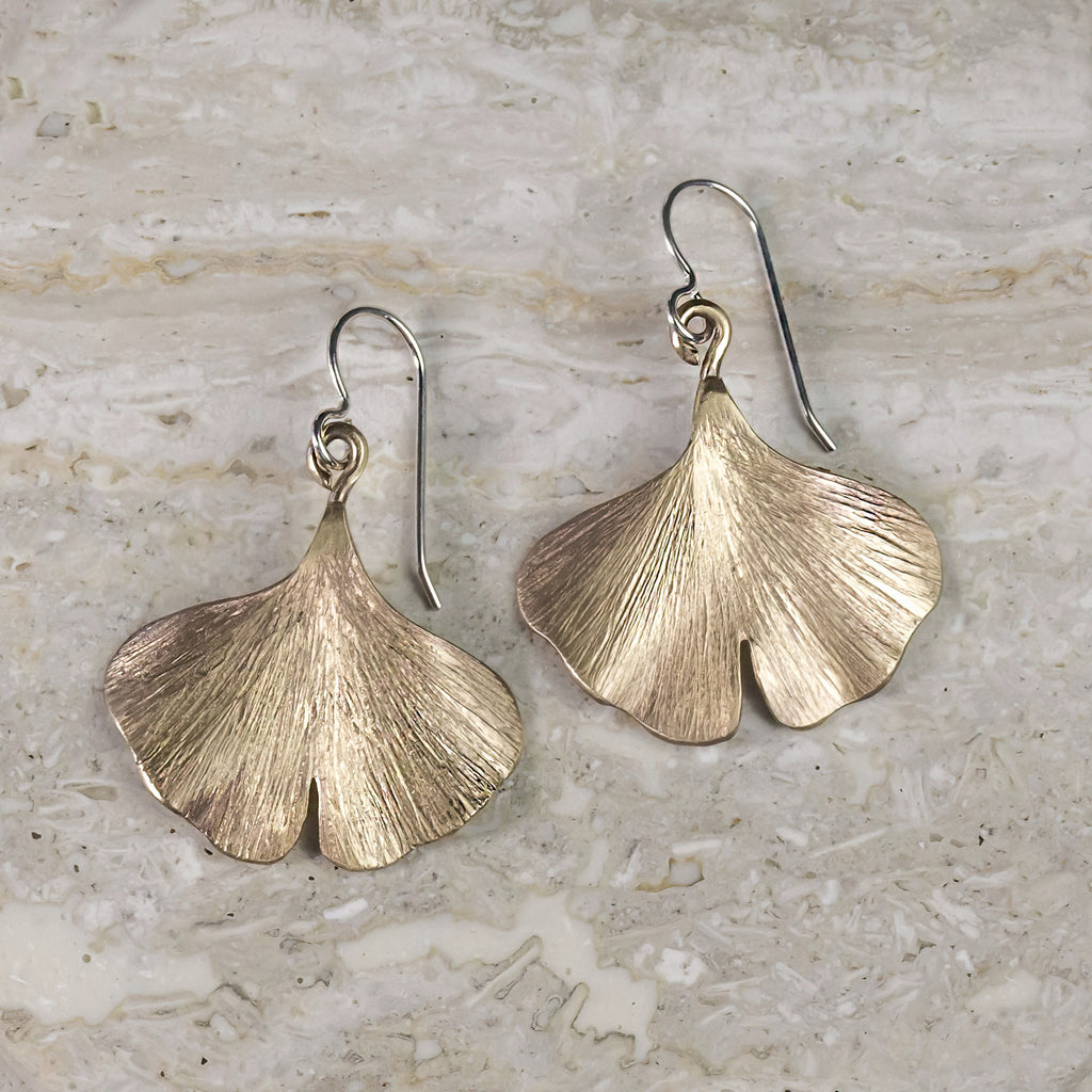 Gold-tone brass ginkgo leaf drop earrings with fishhook backs