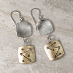Textured brass and sterling silver dangle earrings with square cutout charms