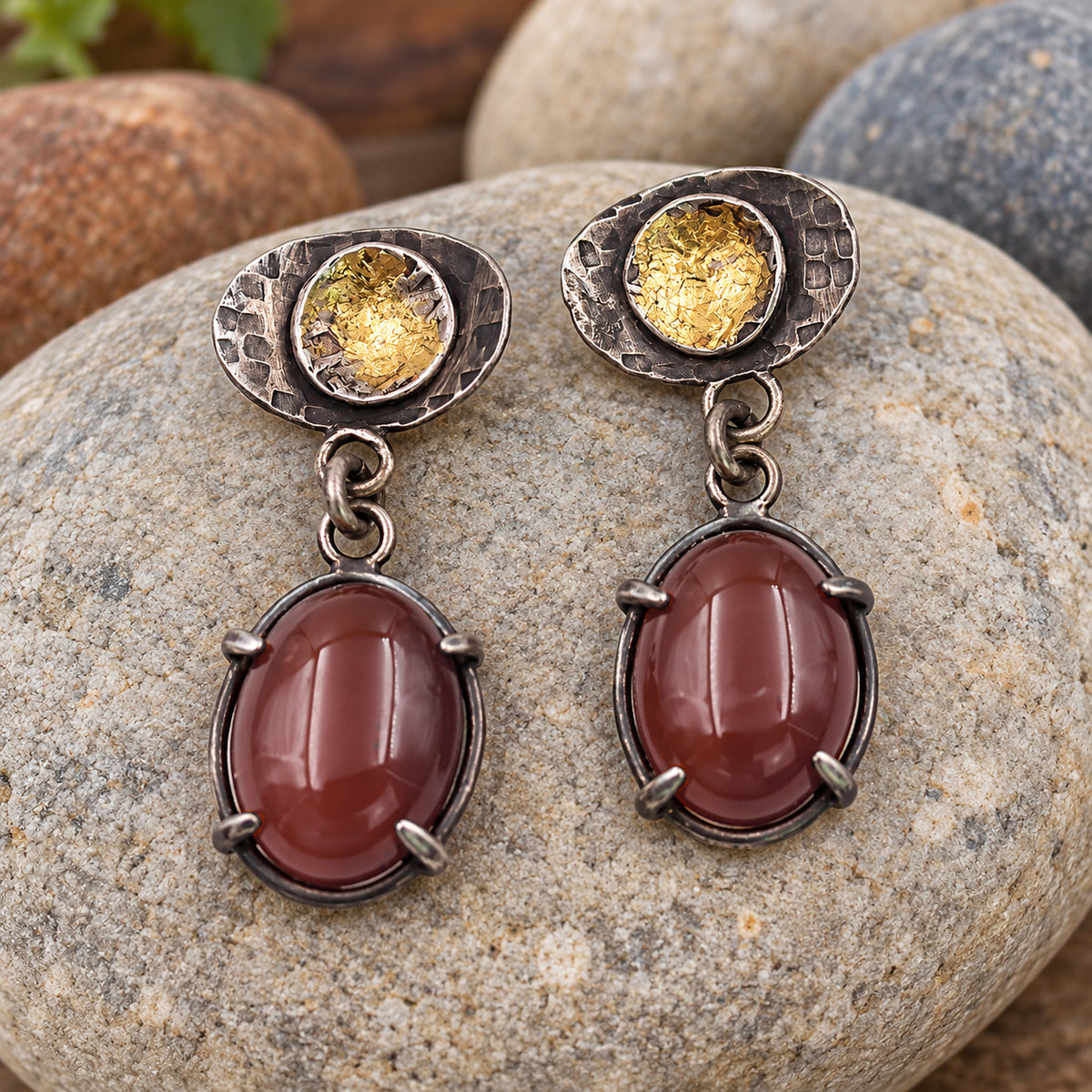 Pair of carnelian and 24K sterling silver earrings with oval stones and textured oval tops