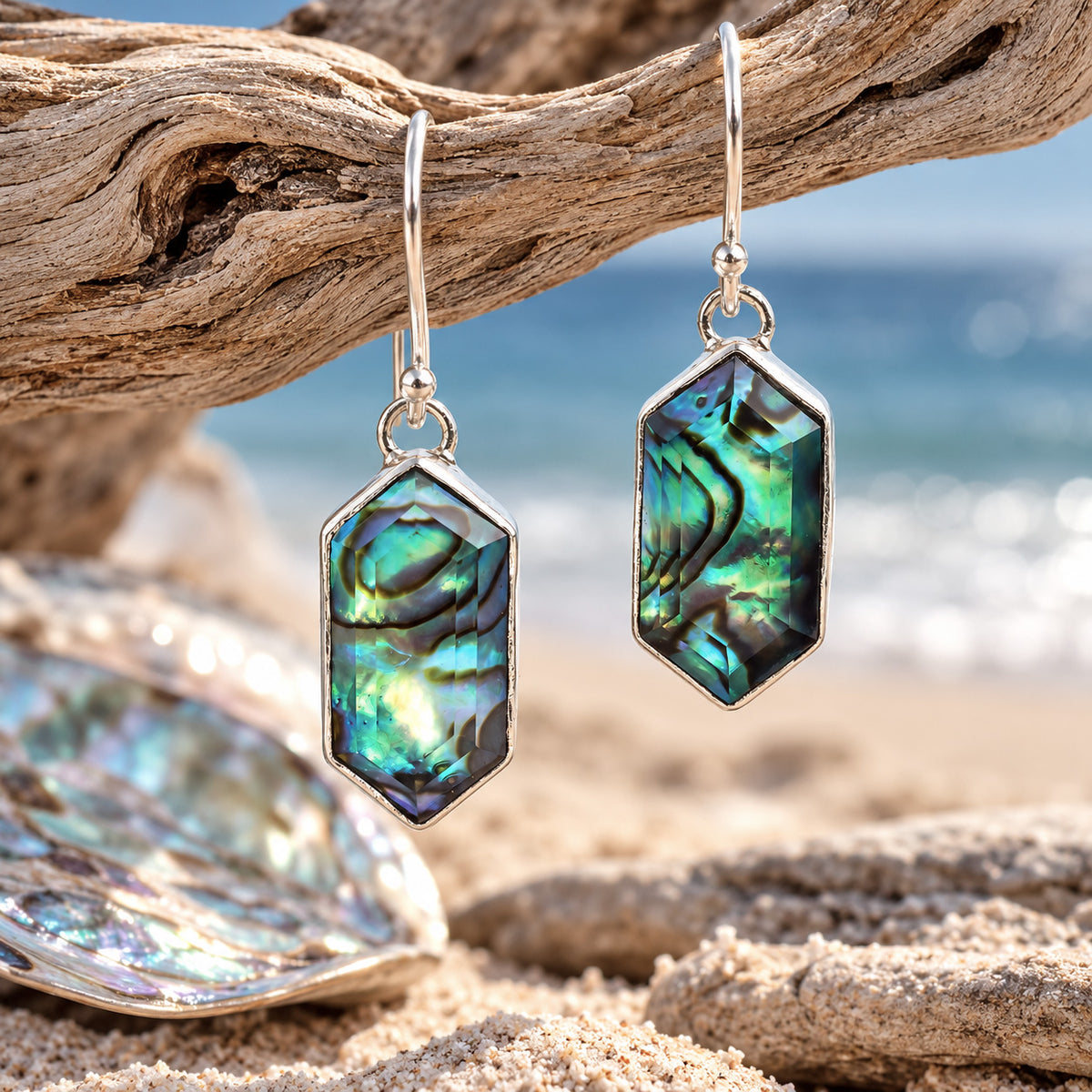 Sterling silver abalone shell drop earrings with iridescent blue-green inlay