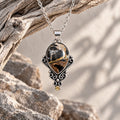 Sterling silver necklace with teardrop jasper pendant and round citrine accent, chain links