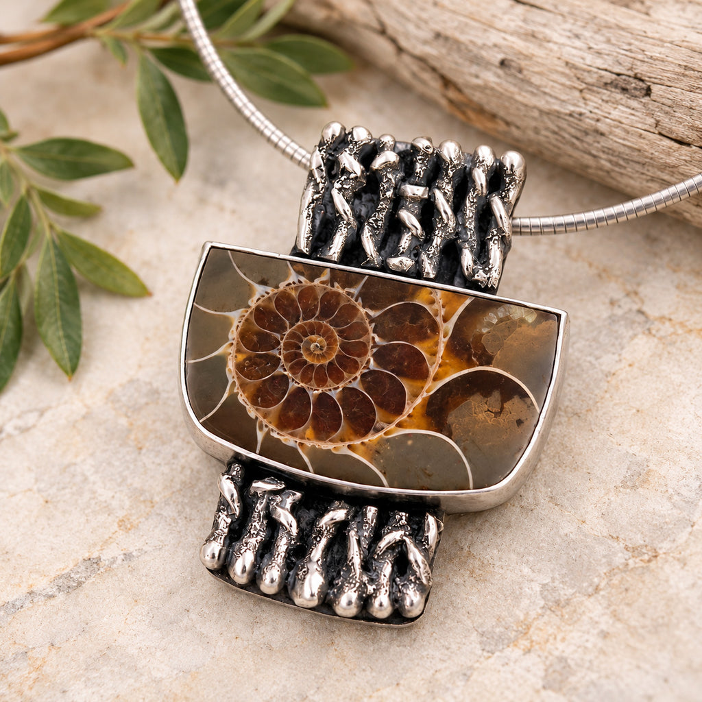 Sterling silver necklace with rectangular ammonite fossil pendant, brown spiral in bezel