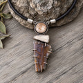 Gemstone pendant necklace: round cabochon, dark quartz cluster on black cord