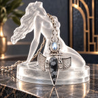 Sterling silver statement necklace with pearl oval centerpiece and teardrop black stone pendant