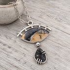 Sterling silver necklace with oval eye jasper drusy pendant and black teardrop stone charm