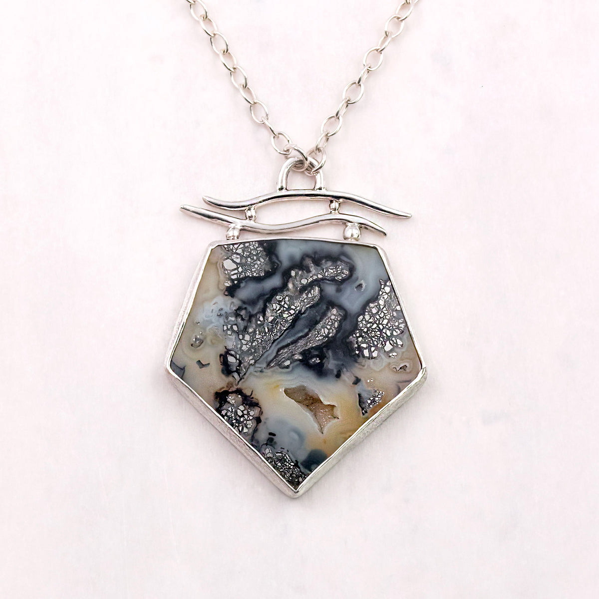 Sterling silver hexagon pendant necklace with dark blue agate and marcasite detailing, chain