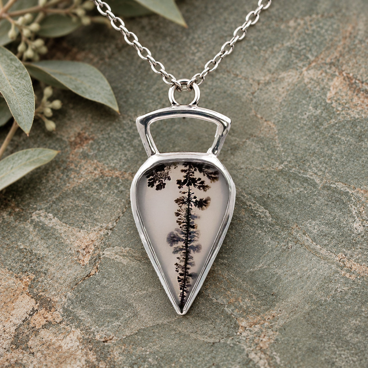 Sterling silver necklace with teardrop dendritic agate pendant, black tree-like pattern