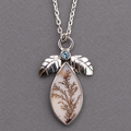 Sterling silver necklace pendant with blue topaz bezel and dendritic agate teardrop