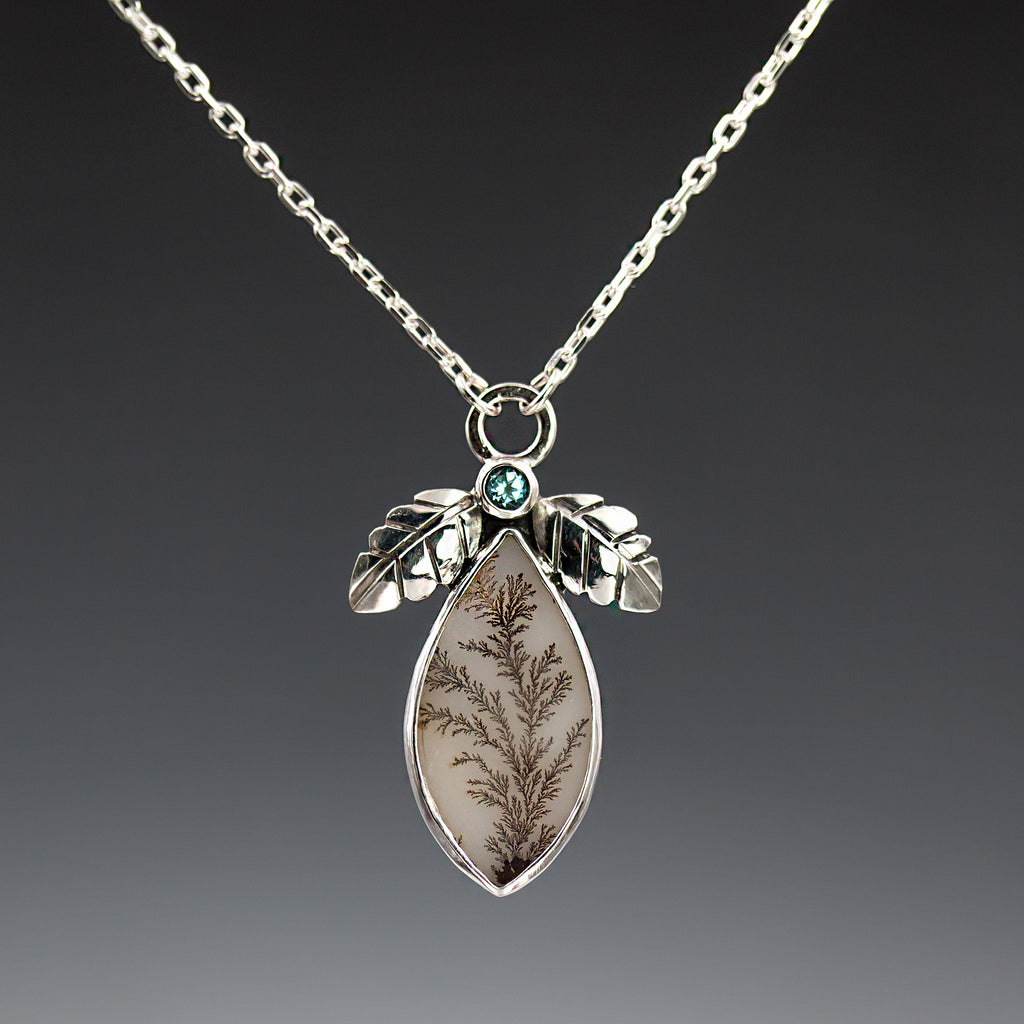 Sterling silver pendant necklace with blue topaz round stone and dendritic agate teardrop