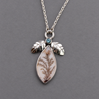 Sterling silver necklace with teardrop pendant, dendritic agate center and blue topaz