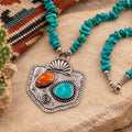 Turquoise beaded necklace with silver spiny oyster pendant and orange/turquoise stones