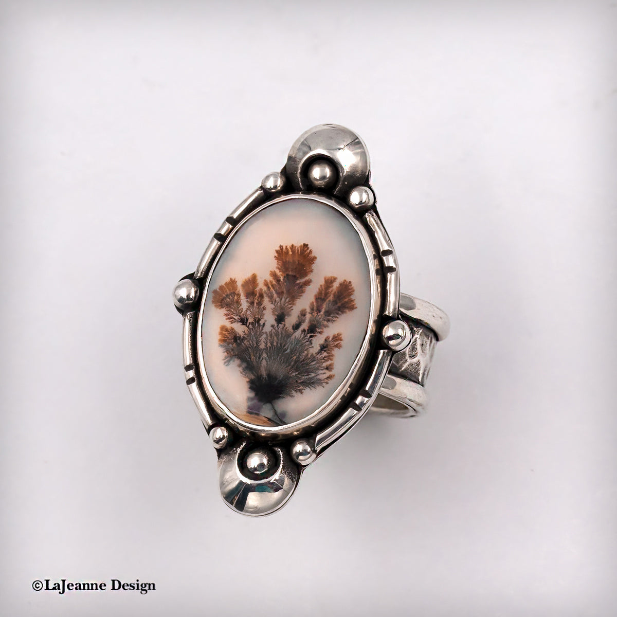 Ring of sterling silver and Dendritic Agate with fern-like tendrils in the stone.