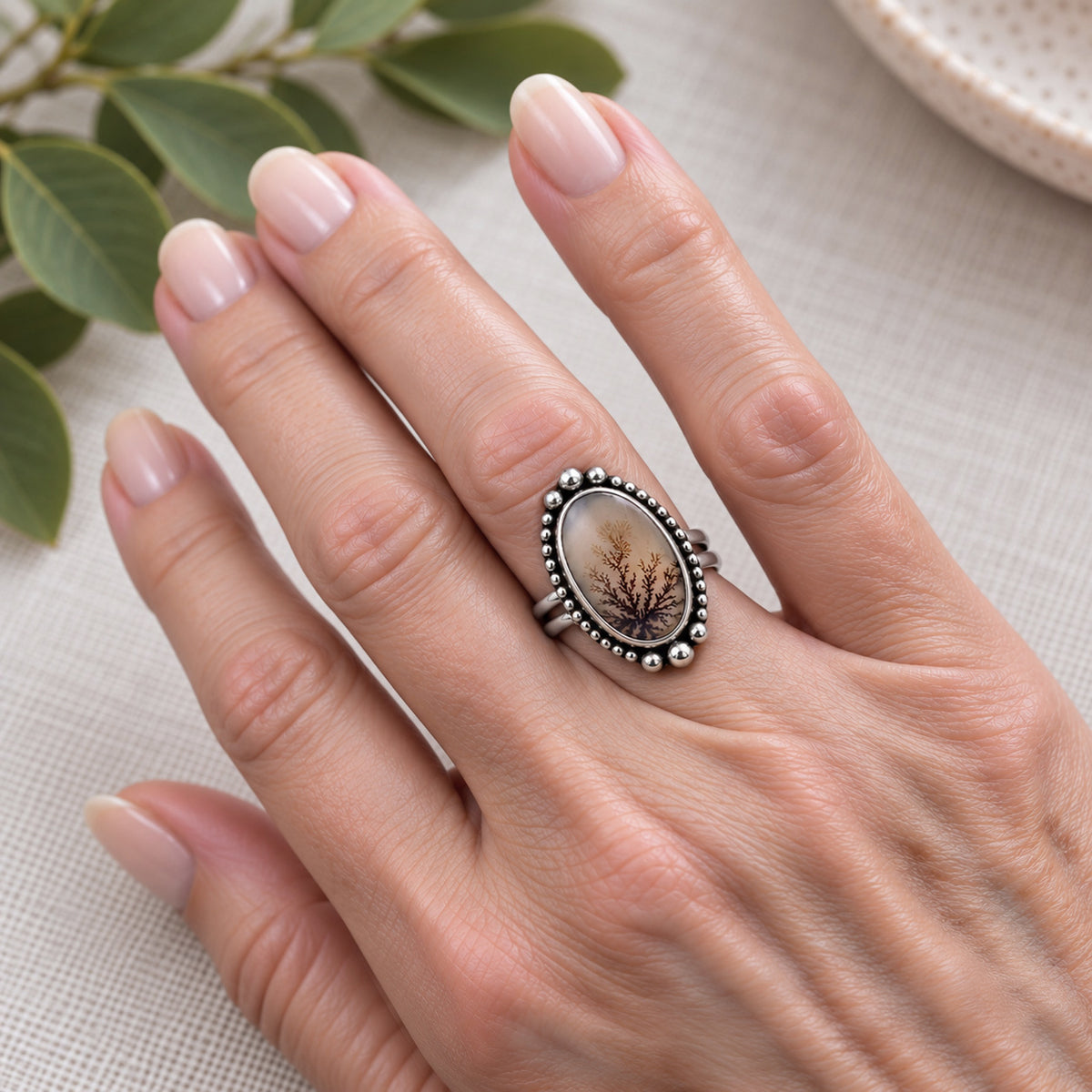 Size 7 sterling silver ring with oval dendritic agate stone and beaded halo bezel