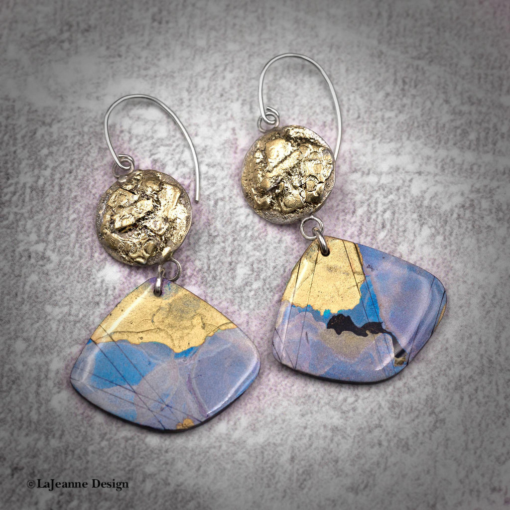 Gold-tone round caps with blue and gold polymer clay fan drops on silver hooks